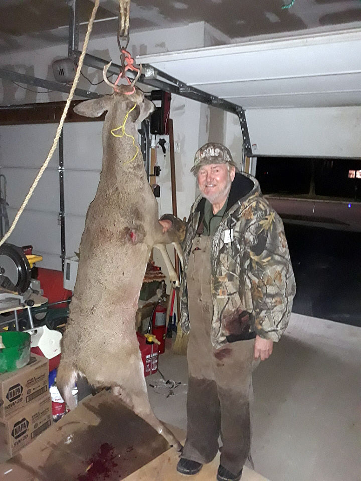Pastor Dave with deer.jpg